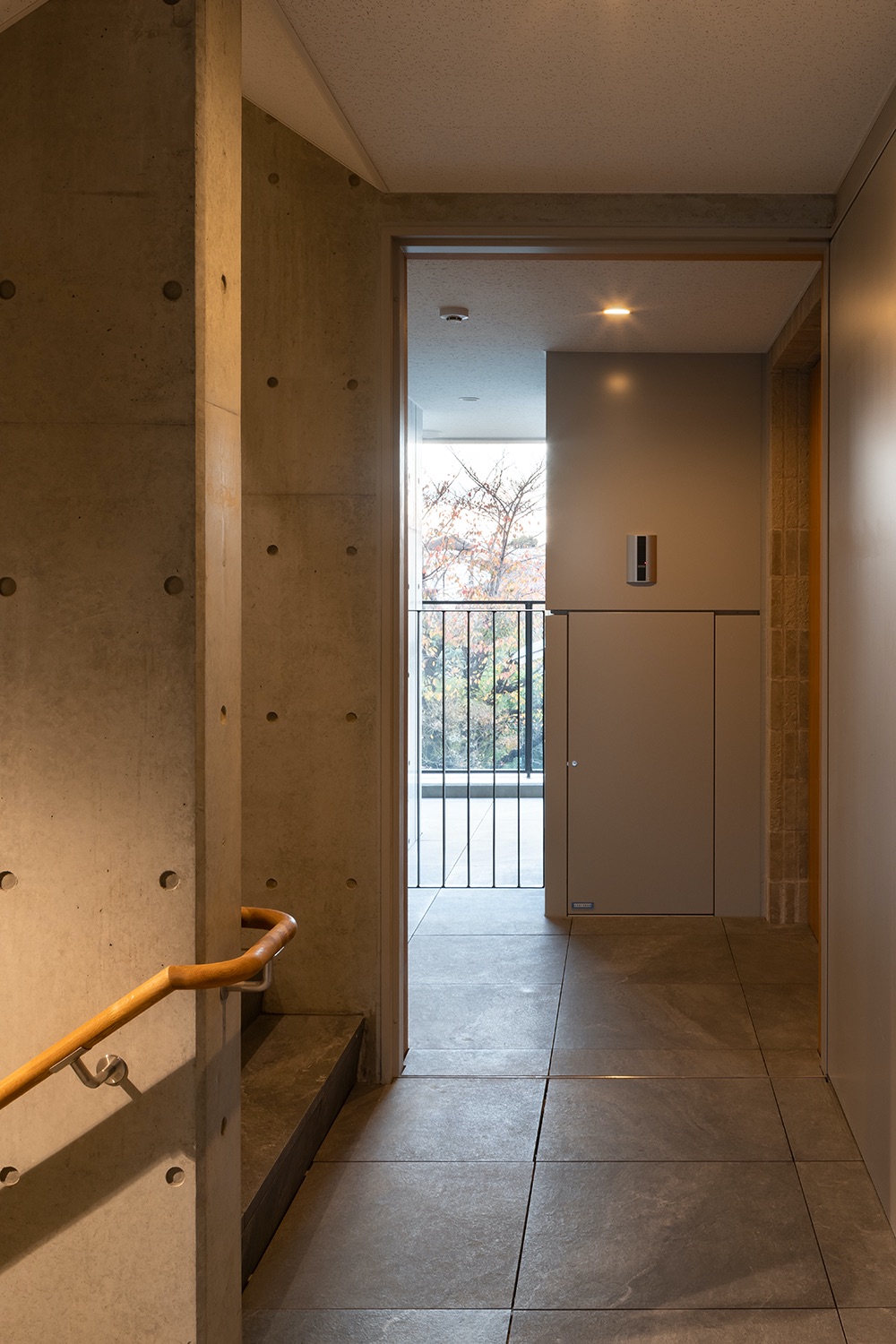 Stair landing with unit terrace   Stair landing with unit terrace